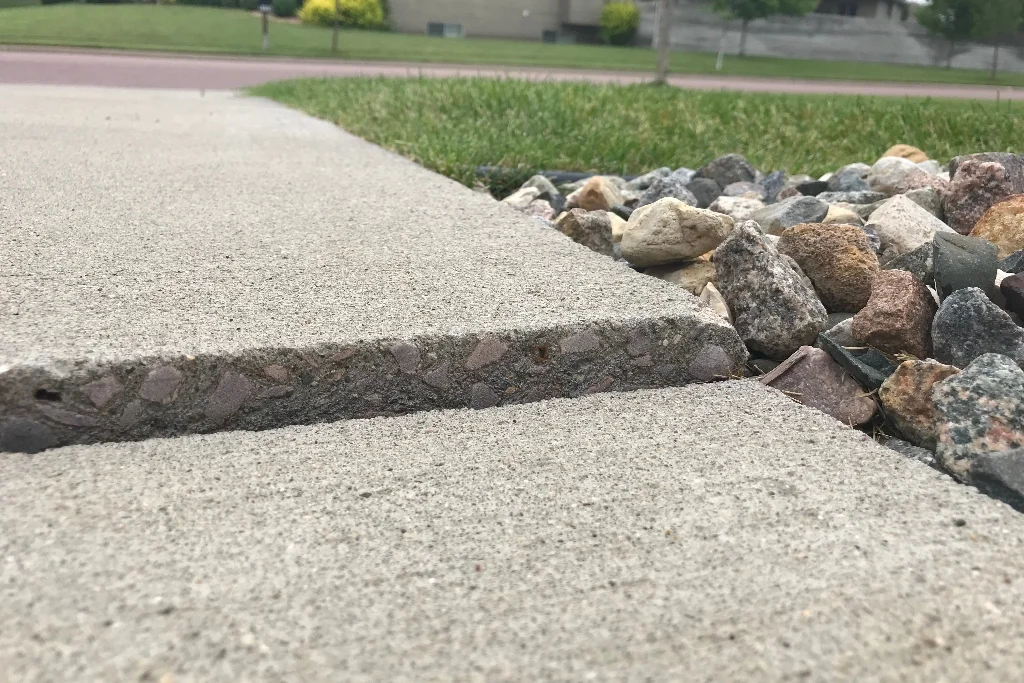 Slabjacking concrete sidewalks